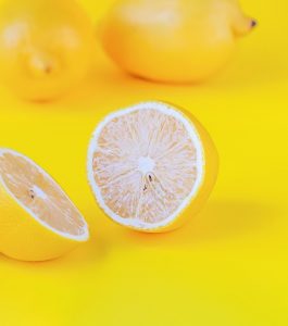 fresh-lemon-on-yellow-background-2022-05-14-11-42-52-utc